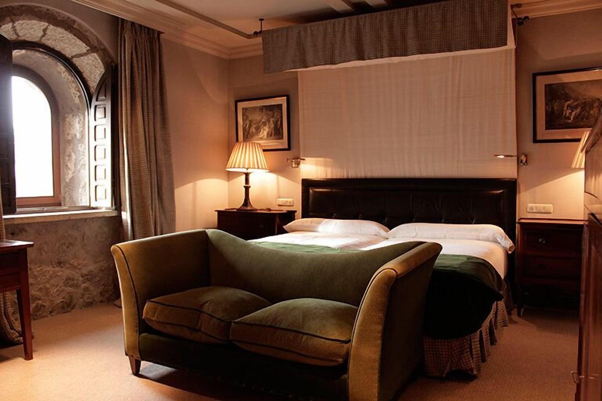Landa Hotell Burgo Exteriör bild A room at the hotel